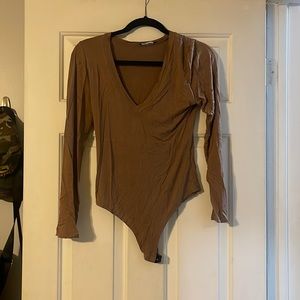 Gently worn fashion nova body suit